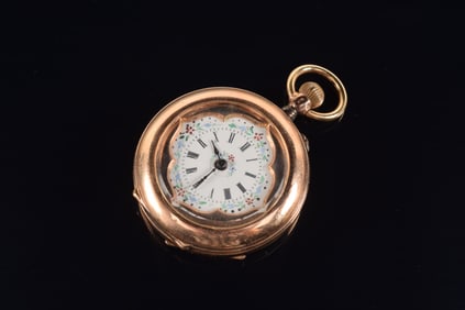 14K gold Swiss pocket watch. Open face enamel decorated dial with Roman numerals. Case marked K14,
