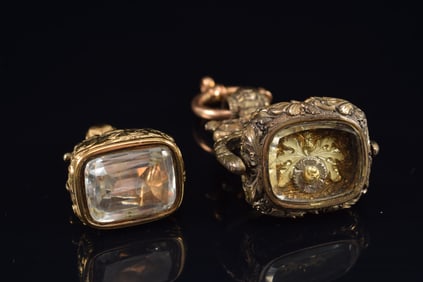 2 watch fobs. 1) 14K gold white topaz mounted fob. Large rectangular cut stone measures 19.5 x 15mm.