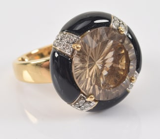 18K gold citrine and diamond mounted ring. Black stone mounts. Citrine 13.5mm diameter. Bead sizers