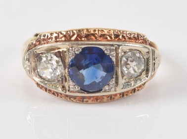 Antique 14K gold sapphire and diamond ring. Round cut sapphire measures about 6.1mm diameter and is