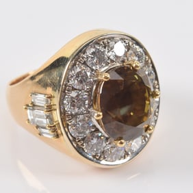 18K gold 11.10ct alexandrite and diamond mounted ring. Oval faceted natural alexandrite measures