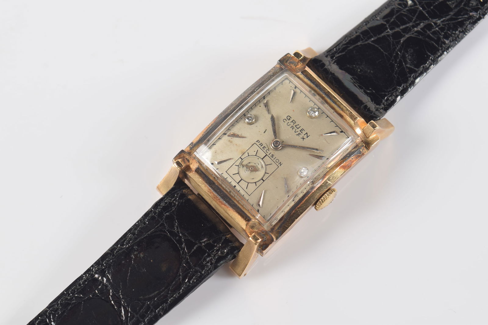 Gruen Curvex 14K gold and diamond vintage wristwatch. Dial set with diamonds at 12, 3, and 9 (1 of 5)