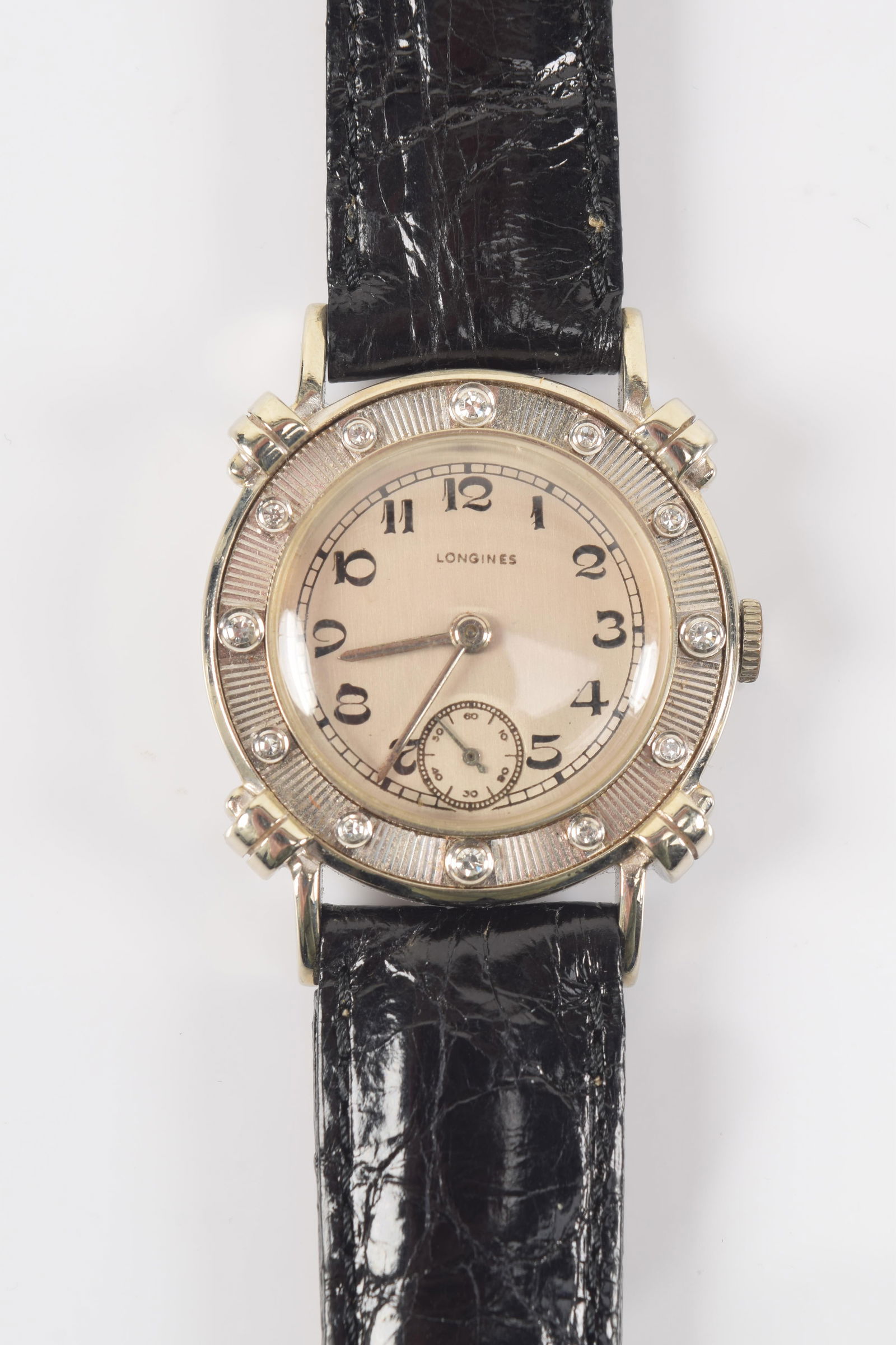Longines vintage 14K gold and diamond mounted wristwatch. Deco style Roman numerals. Bezel set with (1 of 4)