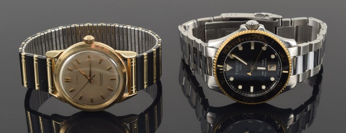 2 men's wristwatches. 1) 14K gold Cyma automatic watersport. Surface scratches. 2) Tissot Seastar.