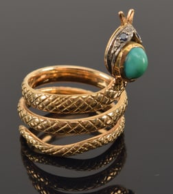 18K gold coiled snake ring set with turquoise head and sapphire eyes. Unmarked but tests as 18K.