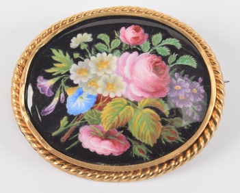 Antique 18K gold enamel pin with decoration of a floral arrangement. Frame unmarked but tests as