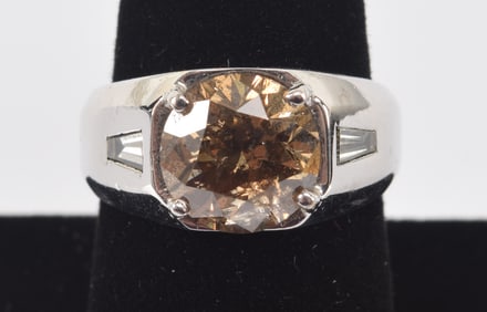 14K white gold 4.54ct round brilliant cut "champagne" diamond ring. Diamond measures 10.19-10.21 x