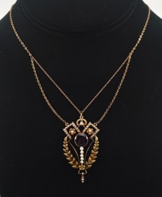 Antique 14K gold pendant necklace. Round amethyst glass with seed pearls in an openwork geometric