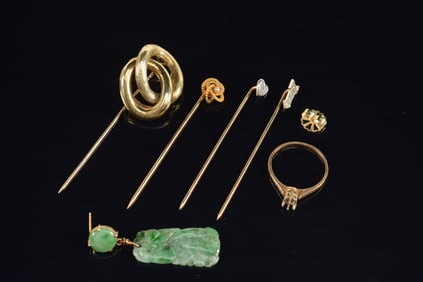 Lot of 14K gold jewelry. 1) Interlocked ring stick pin. 2) 2 small diamond mounted stick pins. 3)