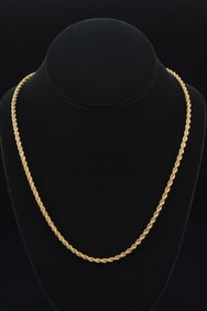14K gold rope twist necklace. 19.5in length. Marked 14K. 19.5 grams.