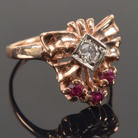 Retro 14K rose gold ruby and diamond bow ring. Marked 14K. Ring size 7.5. 3.9 grams.