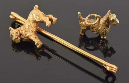2 gold Scottie dog accessories. 1) 18K gold safety pin. Marked Dreus and hallmarked on pin. 9.6