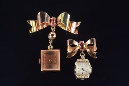 2 14K gold retro pendant watches. Bow form pins set with rubies. One with rose and yellow gold, the
