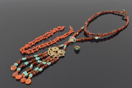 Lot of Asian jewelry. 1) Amber, turquoise, coral, and stone beaded necklace with silver coin and bat