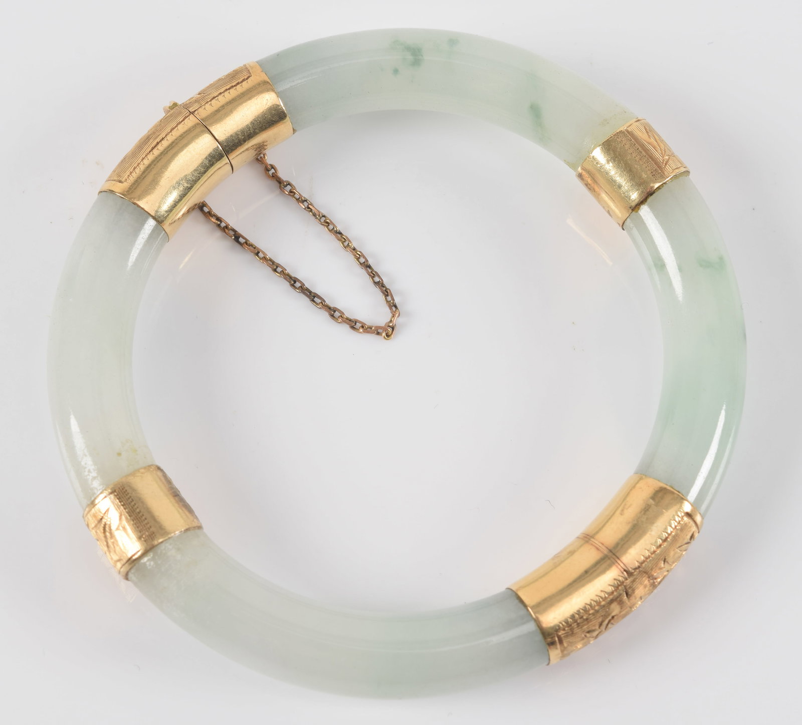14K gold Chinese jade brangle bracelet. Stone of a white color with green markings. 14K gold mounts (1 of 3)