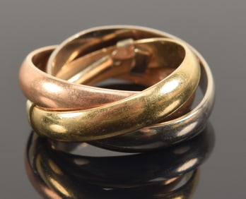 18K gold English tri color puzzle ring. Hallmarked. Ring size 4. 10.5 grams.