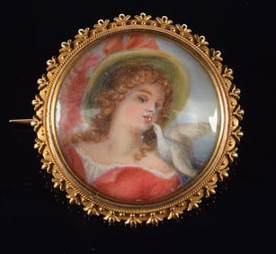 14K gold pin with miniature painting. Scene of a woman with bird eating from her mouth. Ornate gold