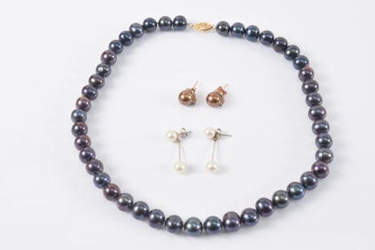 Lot of pearl jewelry. 1) 14K gold clasped black pearl necklace. Each about 9.2mm diameter. 16in