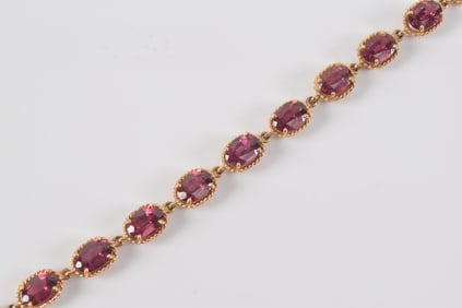 14K gold rubelite tourmaline mounted bracelet. Braided design gold mounts. Marked. Metal links added