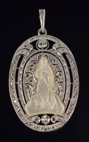 18K white gold diamond and carved mother of pearl religious pendant. Diamonds each about 2.5mm