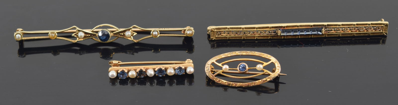 4 vintage gold sapphire mounted bar pins. 2 marked 14K (1 large, 1 small), 2 marked 10K (1 large, 1 (1 of 6)