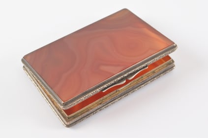 Antique 800 silver agate compact. Stone of a reddish-orange color. Maker's mark and 800 on interior