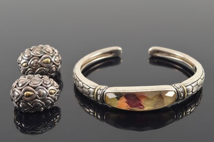 Asch Grossbardt gold and sterling silver cuff bracelet. Faceted surface over stone or enamel inlay.