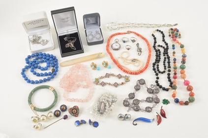 Large lot of vintage silver and costume jewelry. Including mid century enameled leaf pin and