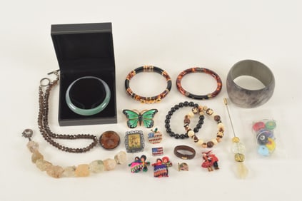 Assortment of costume jewelry.