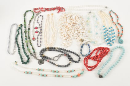 Large lot of fashion necklaces, some with silver. To include: Some turquoise beads, agate,