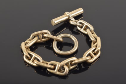 Vintage Hermes chain link and toggle bracelet. Marked on link. 7.5in length.