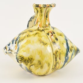 Betty Woodman. American. Glazed earthenware art pottery pinched-pillow pitcher. Yellow, dark green,