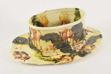 Betty Woodman. American. Glazed earthenware art pottery one-piece vessel and tray. Green, brown, and