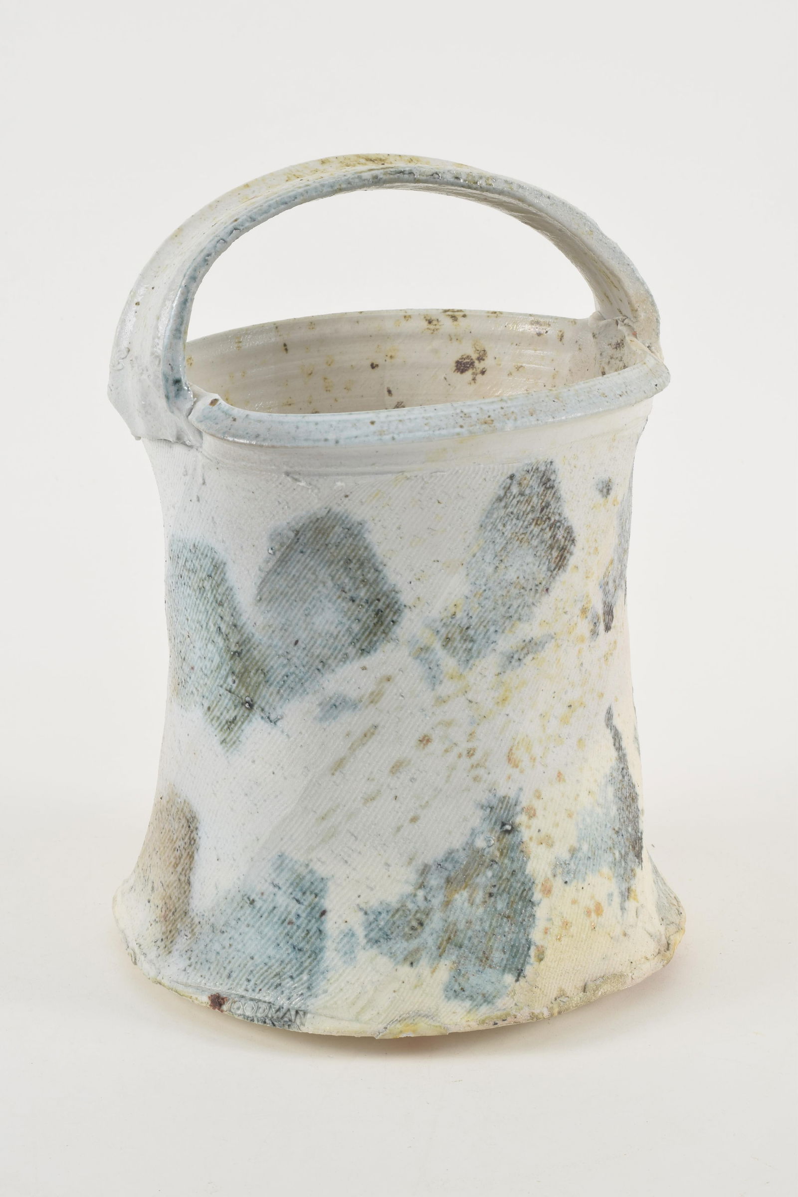 Betty Woodman. American. Glazed earthenware art pottery handled vessel. Spiral faceted body with (1 of 9)