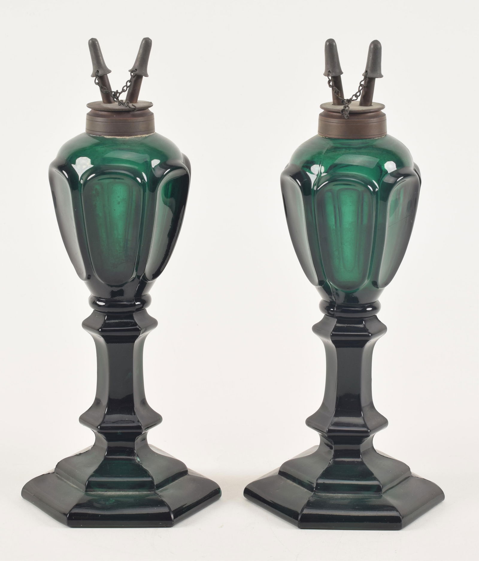 Pair of rare dark green whale oil lamps with fonts, 19th Century. Height 11 in.: Pair of rare dark green whale oil lamps with fonts, 19th Century. Height 11 in.