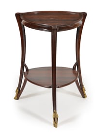 Louis Majorelle rosewood Art Nouveau two-tier triangle table with floral form gilt bronze mounts,