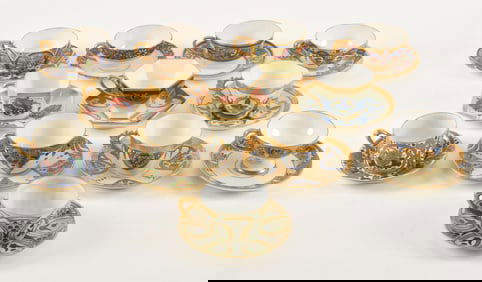 12 porcelain Arts & Crafts free hand decorated cups and saucers from various factories. Some with