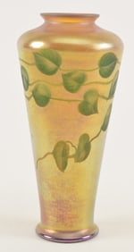 Tiffany Studios favrile glass vase with intaglio leaf and vine decorations with green leaves, circa