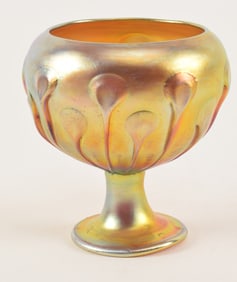 Tiffany favrile glass compote. Gold with relief tear drop tendril decoration. Signed and numbered on