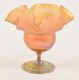 Tiffany Studios favrile glass ruffled edge low footed vase, circa 1900. Etched L.C.T. 6116B.Height 5