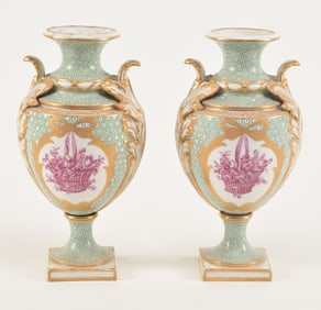 A fine pair of Sevres classical floral handles vases with under glazed blue marks, 19th Century. A