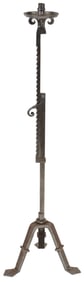 Cast iron adjustable ratchet candle holder on tripod base, 19th Century. Height as shown 45 in.