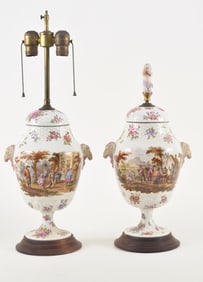 Pair of 18th/19th century Meissen style porcelain covered urns mounted as lamps. Ram's head handles