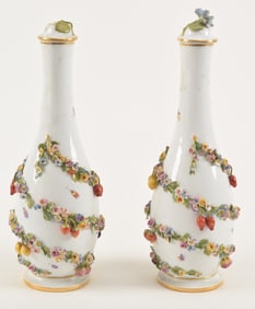 Pair of Meissen floral decorated covered bottle vase with blue under-glazed marks. Diagonal garlands