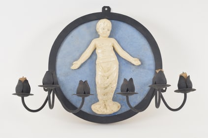 Early Italian round dellarobia pottery plaque with the infant Jesus on blue ground. With later iron