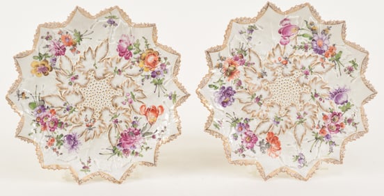 Pair of Meissen maple leaf plates with fine floral and gilt decoration, under glazed blue marks,