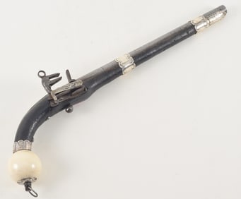 Caucasian flintlock pistol, late 18th/early 19th century. The stock entirely covered in leather and