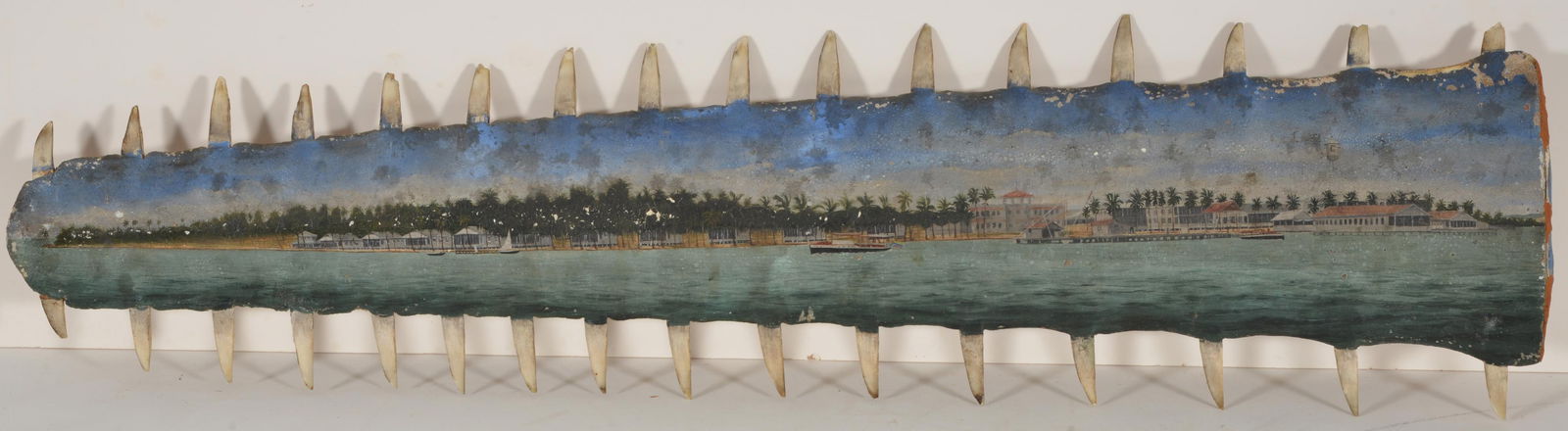 Painted sawfish bill with tropical coastline and yacht flying a Columbian flag, late 19th century. (1 of 8)
