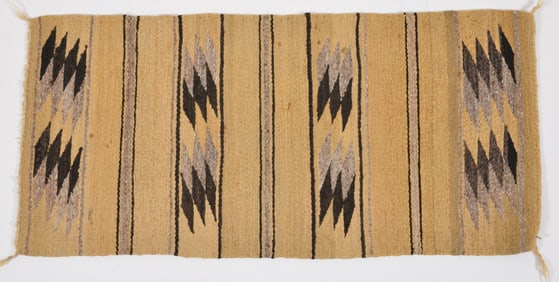 Early 20th century small Navajo weaving. 35.5 x 17in.