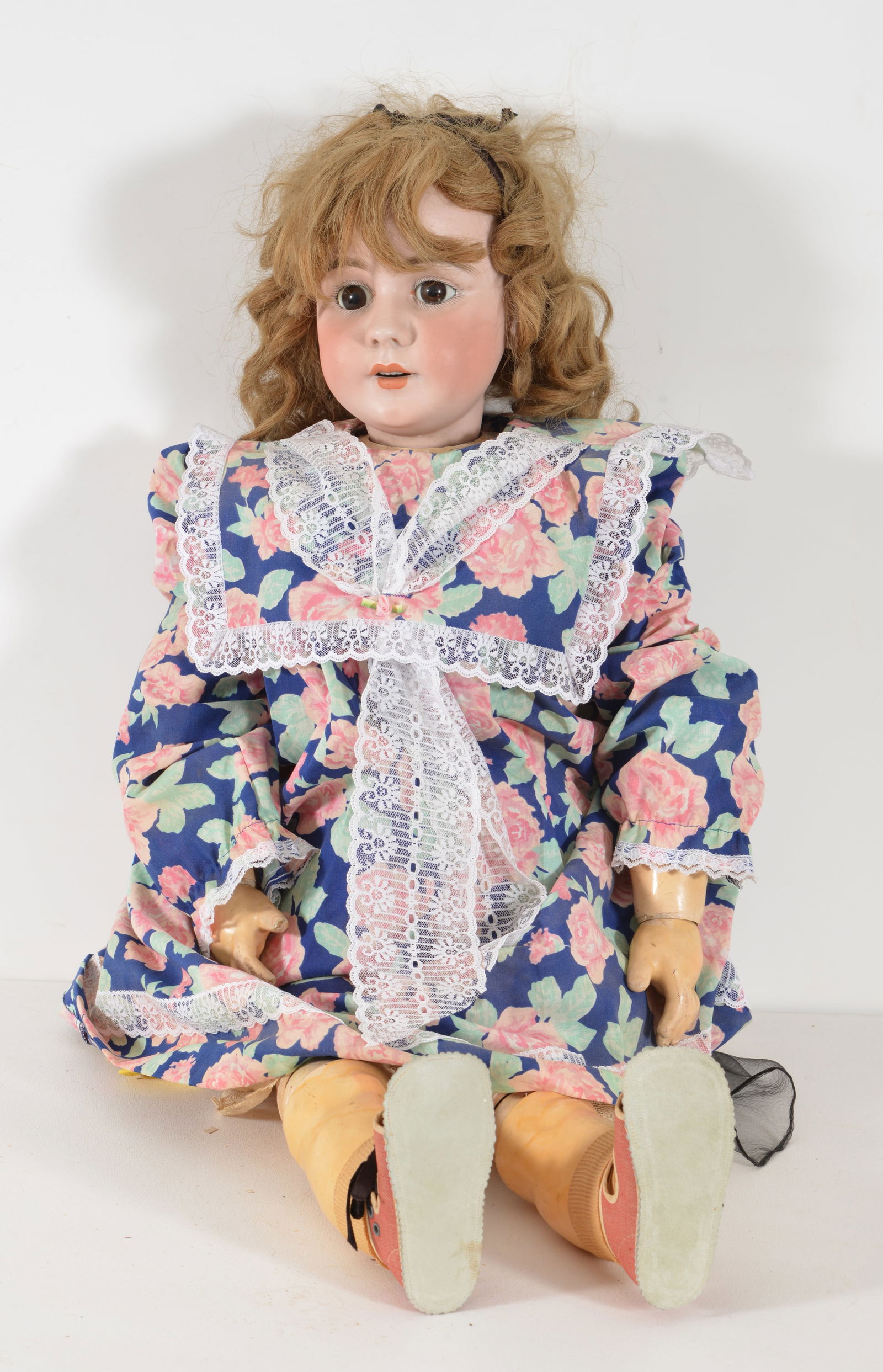 Simon Halbig 939 large German bisque head doll with brown sleep eyes and composite body, circa,: Simon Halbig 939 large German bisque head doll with brown sleep eyes and composite body, circa, 1900. Newer dress and older undergarments. Head marked S 17 H 939. Length 35 in.